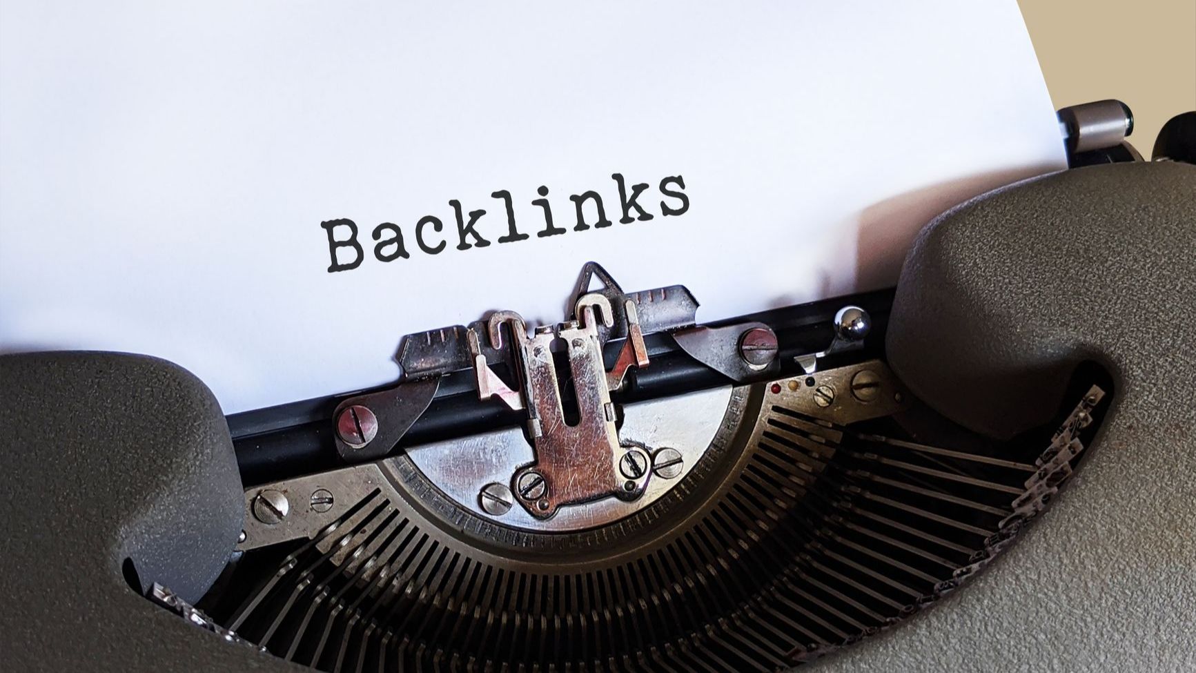 📸 Stock (pexels): Close-up of a vintage typewriter printing the word 'Backlinks,' emphasizing content and SEO concepts. — © 